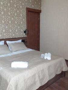Letto o letti in una camera di Cozy House Kazbegi