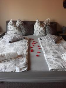 Posteľ alebo postele v izbe v ubytovaní Fox Apartmanok