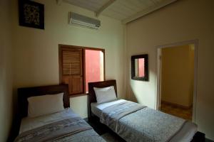 Ένα ή περισσότερα κρεβάτια σε δωμάτιο στο Villa Diamond +14 φωτογραφίες