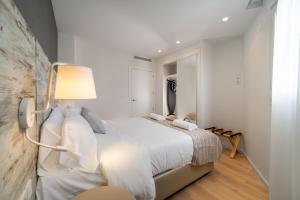Łóżko lub łóżka w pokoju w obiekcie Ahoy Apartments