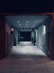 an empty hallway of an office building at night at Hotel Viva in Kragujevac