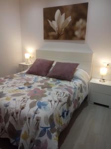 Postel nebo postele na pokoji v ubytování Esplendido APARTAMENTO, CARIHUELA EDIFICIO EL REMO, PRIMERA LÍNEA + 31 fotografií