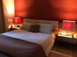 Postel nebo postele na pokoji v ubytování Appartamento in Villa con Piscina - Mhateria Relais