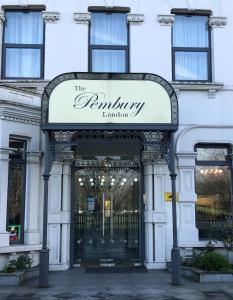 a building with a sign that reads the patriarchy london at Pembury Hotel at Finsbury Park in London