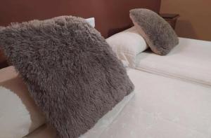 Postel nebo postele na pokoji v ubytování Hotel Sierra de Araceli Lucena