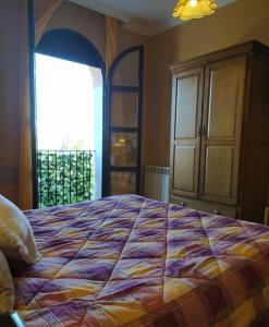 Postel nebo postele na pokoji v ubytování Hotel Sierra de Araceli Lucena