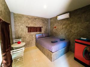 Postel nebo postele na pokoji v ubytování Chill loft โฮมเสตย์