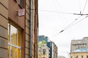 a building with a sign on the side of it at Avita Krasnye Vorota in Moscow