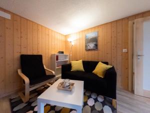 Posezení v ubytování Ferienwohnung Meiringen "Engelhorn"