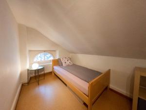 Postel nebo postele na pokoji v ubytování Ferienwohnung Meiringen "Engelhorn"
