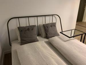 Łóżko lub łóżka w pokoju w obiekcie Near Ozas Studio