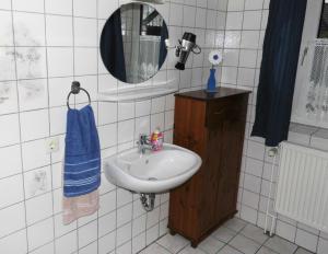 Koupelna v ubytování Haus Ramona + 9 fotografií