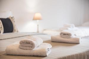 A bed or beds in a room at Platanorema
