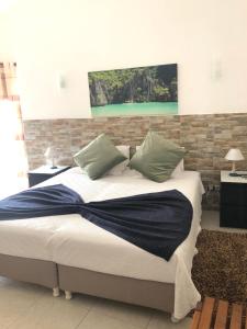 Katil atau katil-katil dalam bilik di Apartamentos e Quartos Atalaia