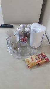 a glass platter with food on a table at Casa Angelo in Vanderbijlpark