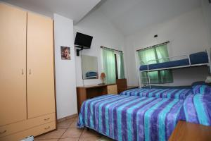 Postel nebo postele na pokoji v ubytování Al Casolare