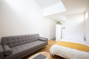 Postel nebo postele na pokoji v ubytování スポルト東京