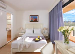 Vasia Resort & Spa客房内的一张或多张床位