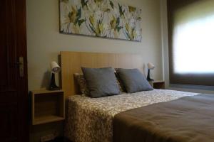 Giường trong phòng chung tại AZURARA BEACH large and sunny apartment