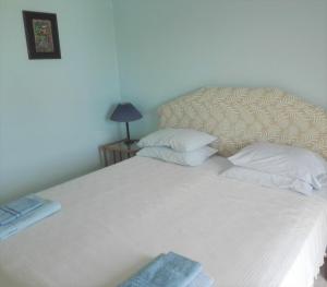 Postel nebo postele na pokoji v ubytování Pasha Bay Residence