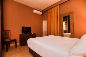 TV a/nebo společenská místnost v ubytování Chillout Hotel Tres Mares