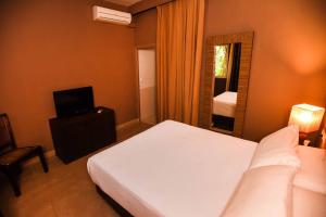 Postel nebo postele na pokoji v ubytování Chillout Hotel Tres Mares