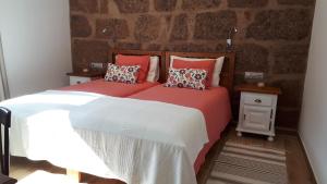 A bed or beds in a room at Casita Tio Manuel