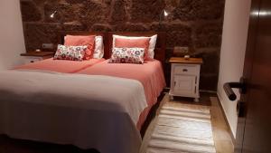 A bed or beds in a room at Casita Tio Manuel
