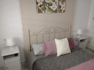 Una cama o camas en una habitación de Apartamento Rotasol