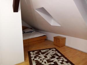 Postel nebo postele na pokoji v ubytování Apartmany Lend