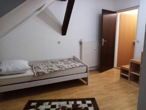 Postel nebo postele na pokoji v ubytování Apartmany Lend