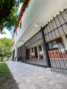 a gate in front of a building at Like Home in Salta