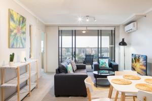 A seating area at AAB Apartments Brisbane