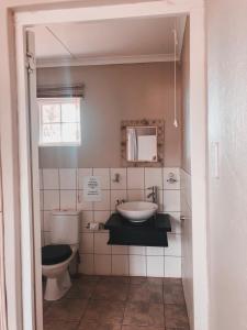 A bathroom at Pennygum Country Cottages