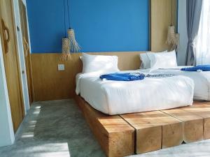 Voodi või voodid majutusasutuse In Touch Resort toas