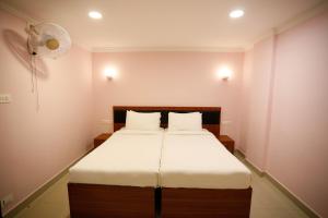 Luxora Hotel and Spa客房内的一张或多张床位