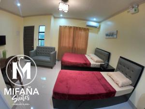 Postel nebo postele na pokoji v ubytování Mifaña Suites - Panglao Island