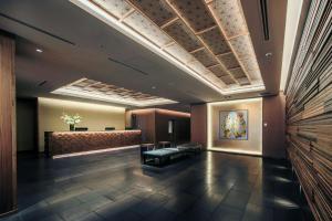 a lobby with a waiting area and a waiting room at Noku Kyoto in Kyoto