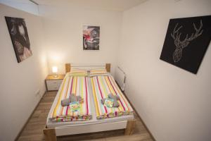 Postel nebo postele na pokoji v ubytování Modern Old Town Apartment