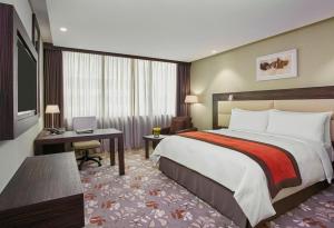 Lova arba lovos apgyvendinimo įstaigoje Crowne Plaza Kuwait Al Thuraya City, an IHG Hotel