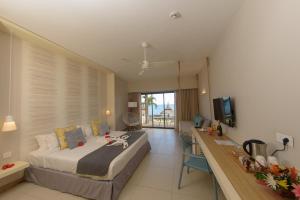 TV a/nebo společenská místnost v ubytování Anelia Resort & Spa