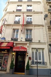 a building with a hotel filene on a street at Ribera Eiffel in Paris