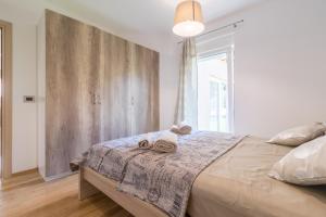 Posteľ alebo postele v izbe v ubytovaní Superb villa Maxima with private pool, sauna, jacuzzi, playground for up to 18 persons, extra pool heating available