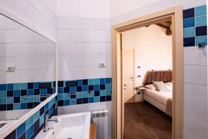 Borgo Degli Angeli Resort e Spa客房内的一张或多张床位