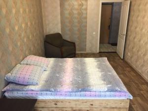 Ліжко або ліжка в номері Apartment on the Obolon