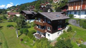 an aerial view of a house in a village at Chalet Gerbera in Wengen