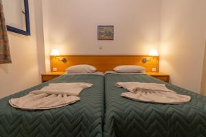 Postel nebo postele na pokoji v ubytování Govino Bay
