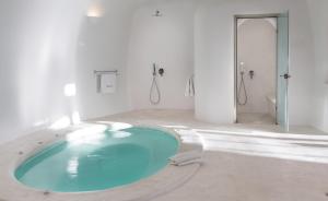 A bathroom at Perivolas Hotel