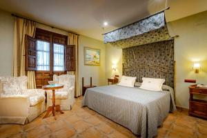 Posteľ alebo postele v izbe v ubytovaní Hospedium Hotel Retiro del Maestre + 37 fotografií