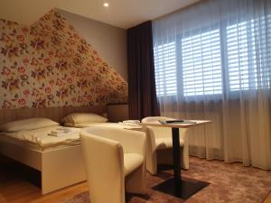 Posteľ alebo postele v izbe v ubytovaní Apartments 461